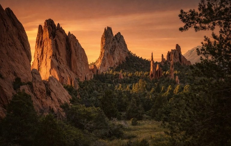 Red rock fins of Garden of the Gods at sunrise, first light catching the stone before it reaches the valley floor.